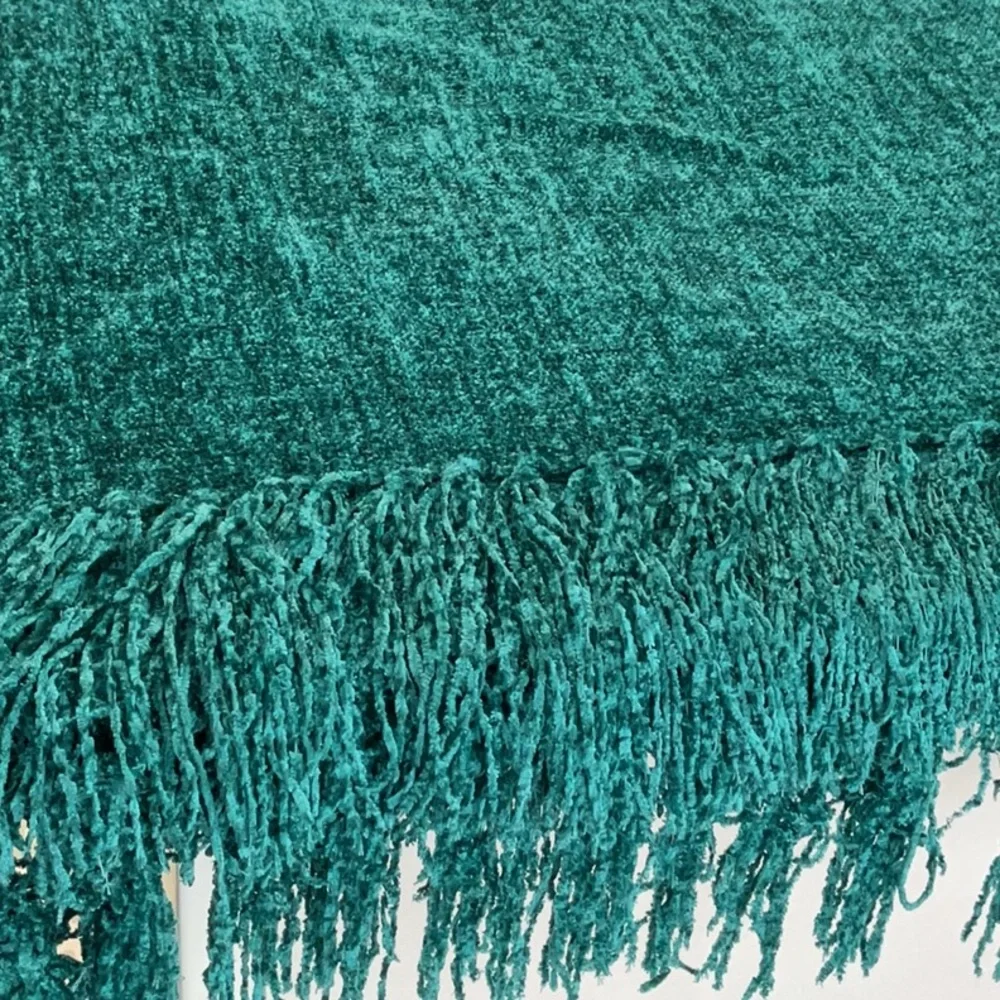 Pier 1 Imports fringed throw.
